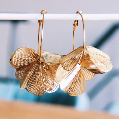 boucles oreilles créoles fleur dorée 7cm acier inoxydable femme